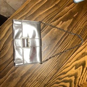 Silver KENNETH COLE purse.